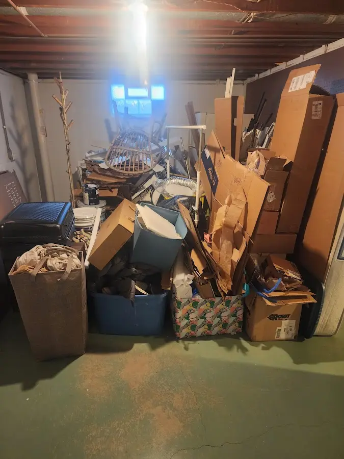 Roll-off dumpster container at job site for 4 Yard Dumpster Rental in Grand Rapids